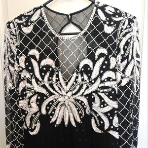 Laurence Kazar New York long sleeve black knee length dress in Medium.